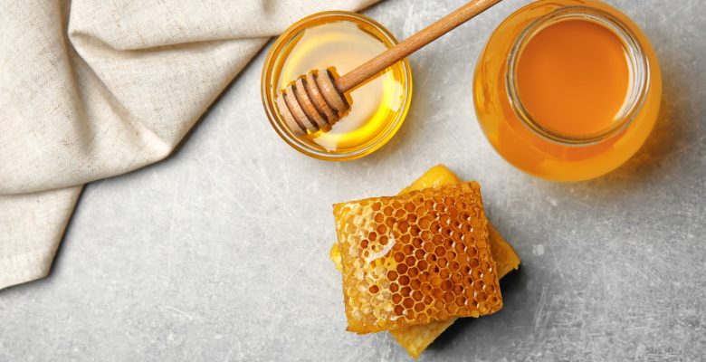 Delicious,Honey,And,Fresh,Honeycombs,On,Table,,Top,View